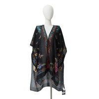 WHITE MANNEQUIN IN OUR NICOLE LEE KIMONO ALMA DE COLORES DESIGN