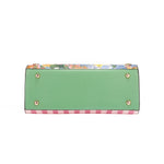THE BOTTOM IS MADE OF VEGAN LEATHER IN A MINT GREEN COLOR.