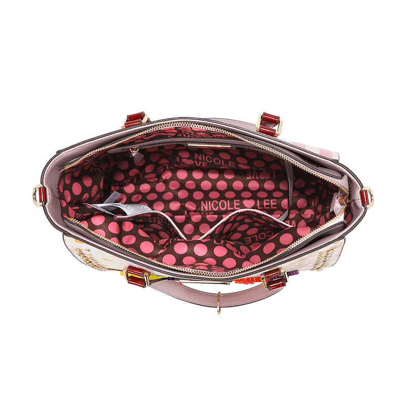 A VIEW FROM ABOVE, YOU CAN SEE THE COMPARMENTS AND THE POLKA DOT PRINTED POLYESTER INTERIOR LINING.