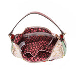 A VIEW FROM ABOVE, YOU CAN SEE THE COMPARMENTS AND THE POLKA DOT PRINTED POLYESTER INTERIOR LINING.