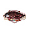 A VIEW FROM ABOVE, YOU CAN SEE THE COMPARMENTS AND THE POLKA DOT PRINTED POLYESTER INTERIOR LINING.