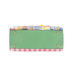 THE BOTTOM IS MADE OF VEGAN LEATHER IN A MINT GREEN COLOR.