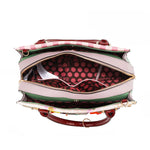 A VIEW FROM ABOVE, THE COMPARMENTS AND THE POLKA DOT PRINTED POLYESTER INTERIOR LINING.
