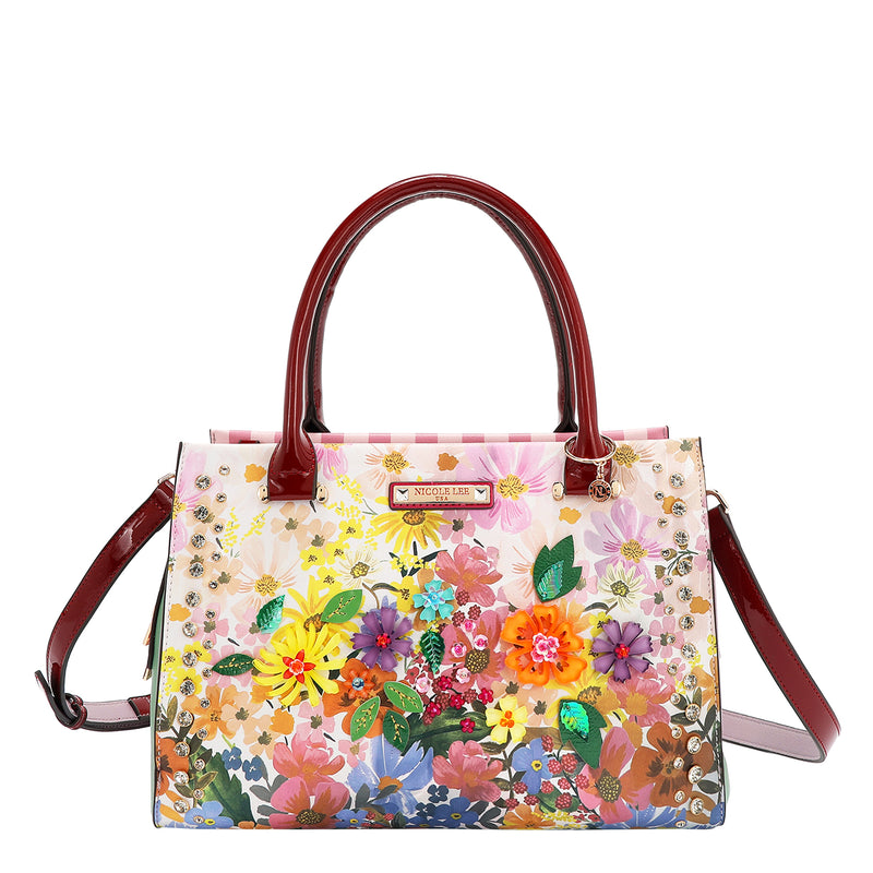 OUR NICOLE LEE HANDBAG  IN DREAMS BLOSSOM DESIGN AND ADJUSTABLE STRAP.
