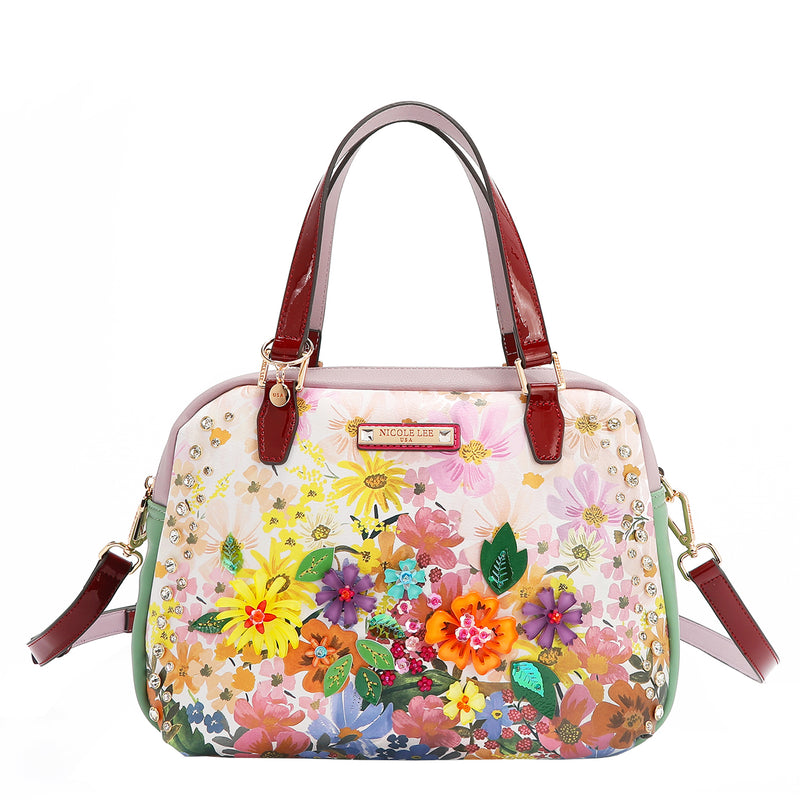 OUR NICOLE LEE HANDBAG  IN DREAMS BLOSSOM DESIGN AND ADJUSTABLE STRAP.