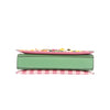 THE BOTTOM IS MADE OF VEGAN LEATHER IN A MINT GREEN COLOR.