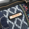Close-up of our Nicole Lee bag plaque.