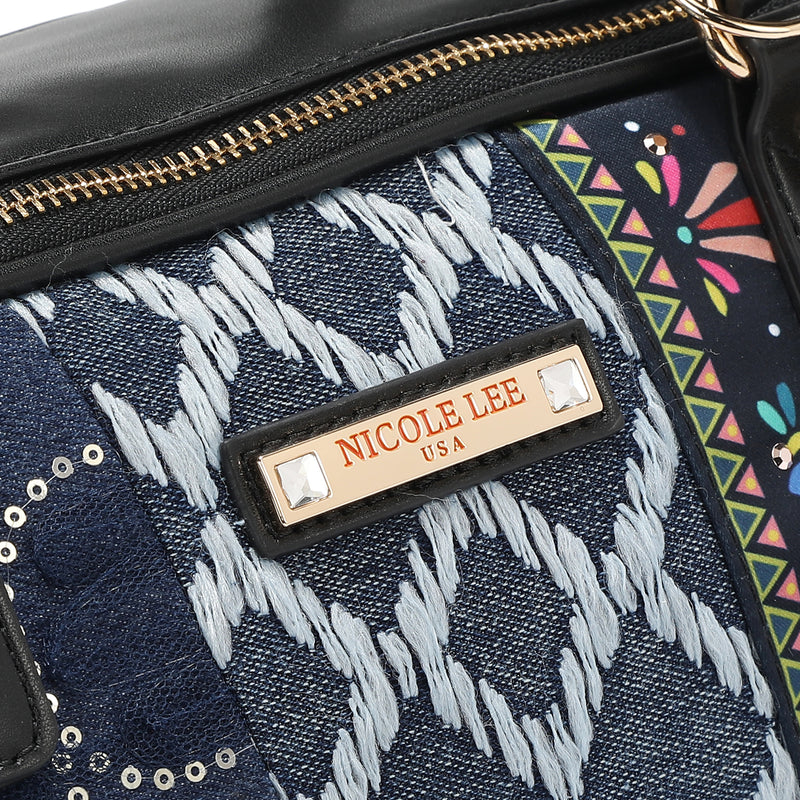 Close-up of our Nicole Lee bag plaque.