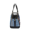 Our denim satchel Bag in our Nicole Lee Bosque de Amor design with black accents set on a white background