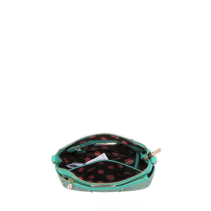 A VIEW FROM ABOVE, THE COMPARMENTS AND POLKA DOT PRINTED POLYESTER INTERIOR LINING.