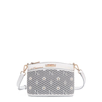 OUR GRACIE CROSSBODY WITH LACER-CUT AND RHINESTONES DETAILS IN COLOR WHITE.