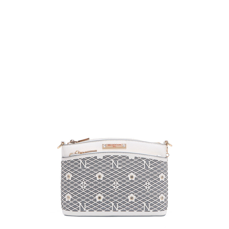OUR GRACIE CROSSBODY WITH LACER-CUT AND RHINESTONES DETAILS IN COLOR WHITE.
