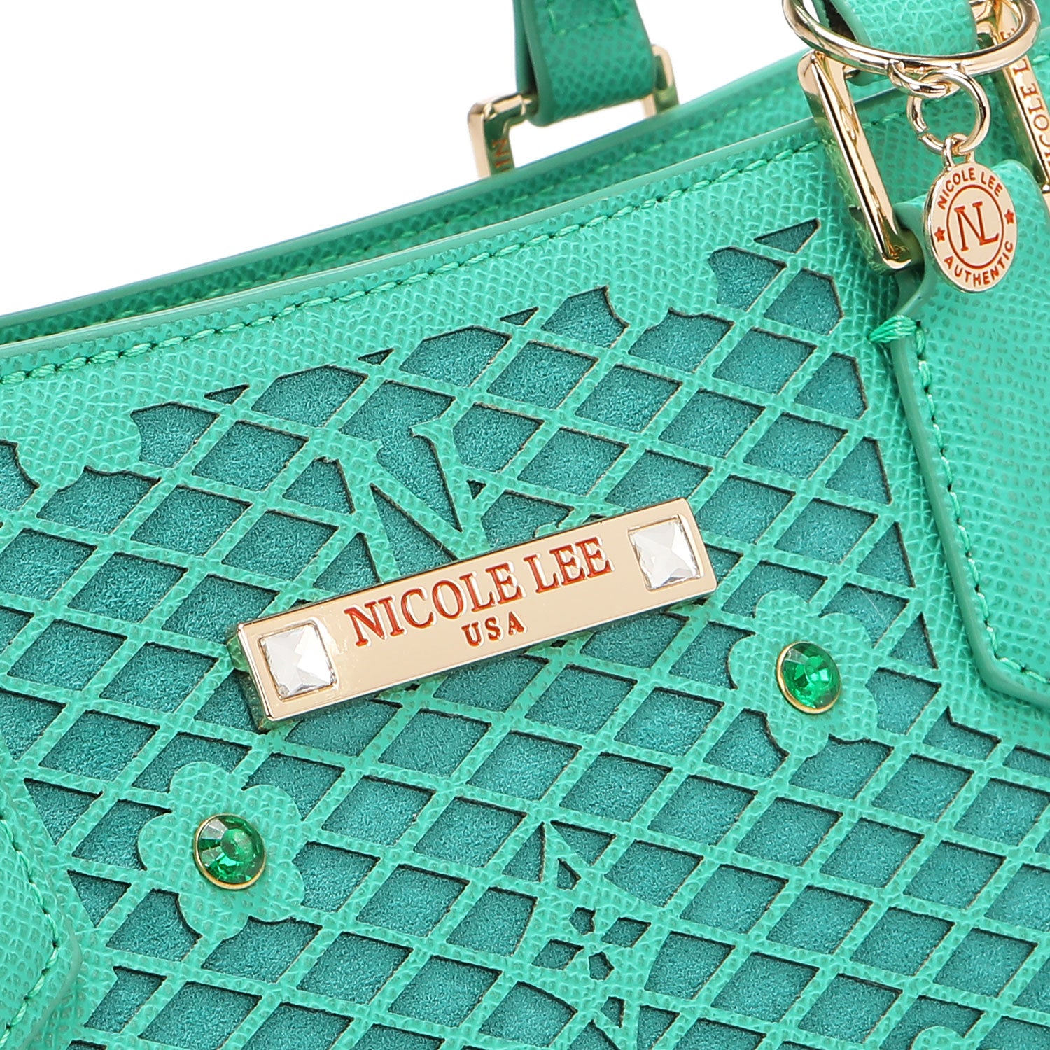 CLOSER LOOK TO THE NICOLE LEE FRONT PLAQUE.