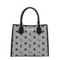 OUR GRACIE STRUCTURED TOTE WITH LACER-CUT AND RHINESTONES DETAILS IN COLOR BLACK.