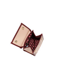 GEOMETRIC CUTOUT CONVERTIBLE BACKPACK / TOP HANDLE BAG