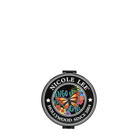 THE BACK OF THE MIRROR HAS THE NICOLE LEE SEAL IN OUR ALMA DE COLORES DESIGN. IN THE MIDDLED IS A MONARCH BUTTERFLY WITH FLOWERS.