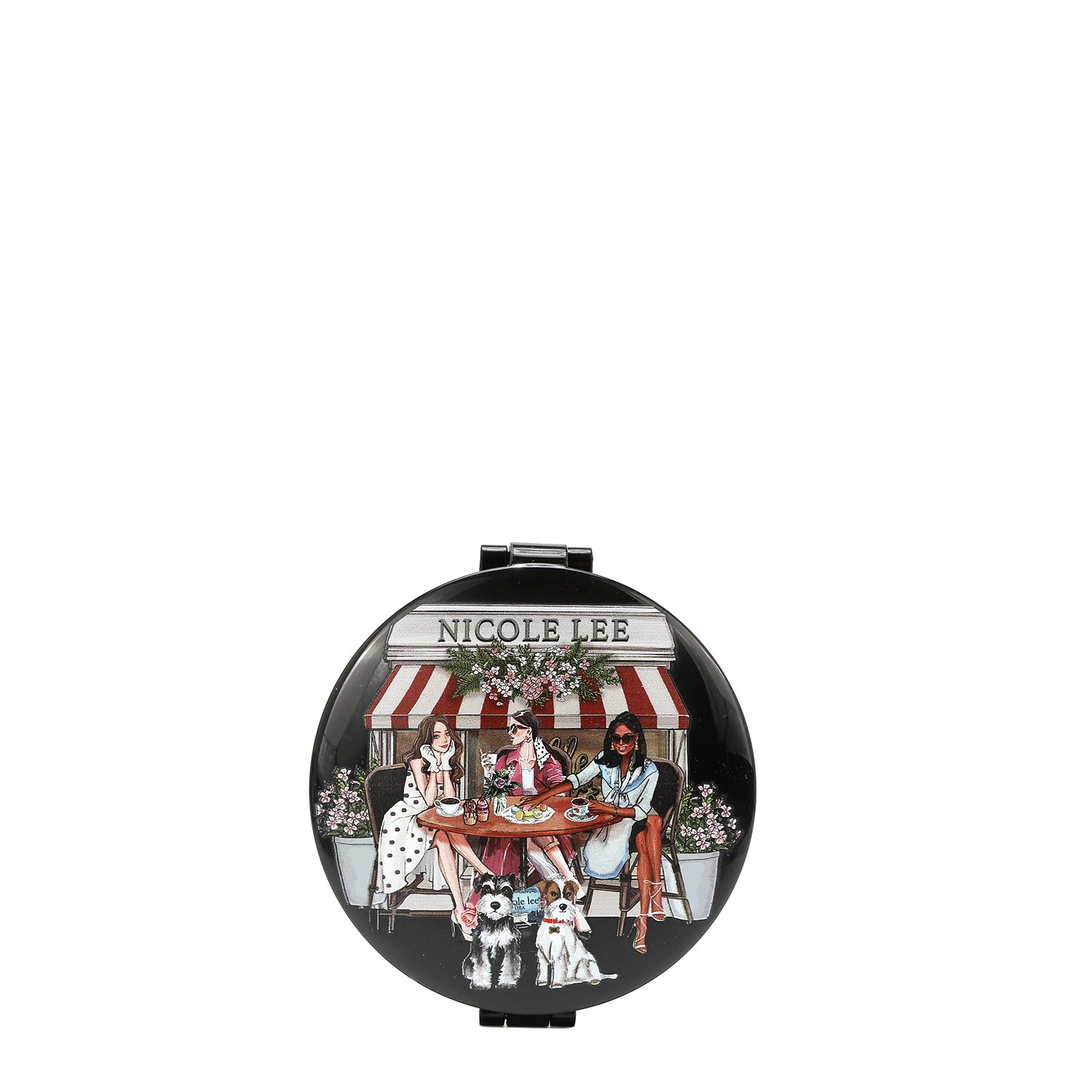 ROUND COMPACT MIRROR WITH OUR SISTERS SECRET DESIGN. THREE WOMEN SITTING IN FRONT OF A BAKERY IN A ROUND COFFEE TABLE, DRINKING COFFEE AND EATING BREAD WITH 2 SCHNAUZER DOGS UNDER THE TABLE.
