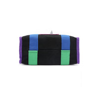 Structured, rectangular base of the Rowan handbag in black by Nodu Nadu. Royal purple trim is accented by the vivid blue and green straps that join together for a mix and match color story. 