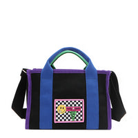 The Rowan bag by Nodu Nadu by Nicole Lee. A bold mix of colors like vivid green, electric blue and vibrant purple trim evoke a sense of fun and lots of personality to mix and match your style. Dual top handles with a 3" drop allow you to carry this statement bag by the top handles or wear it across the body thanks to the optional, adjustable black shoulder strap! 