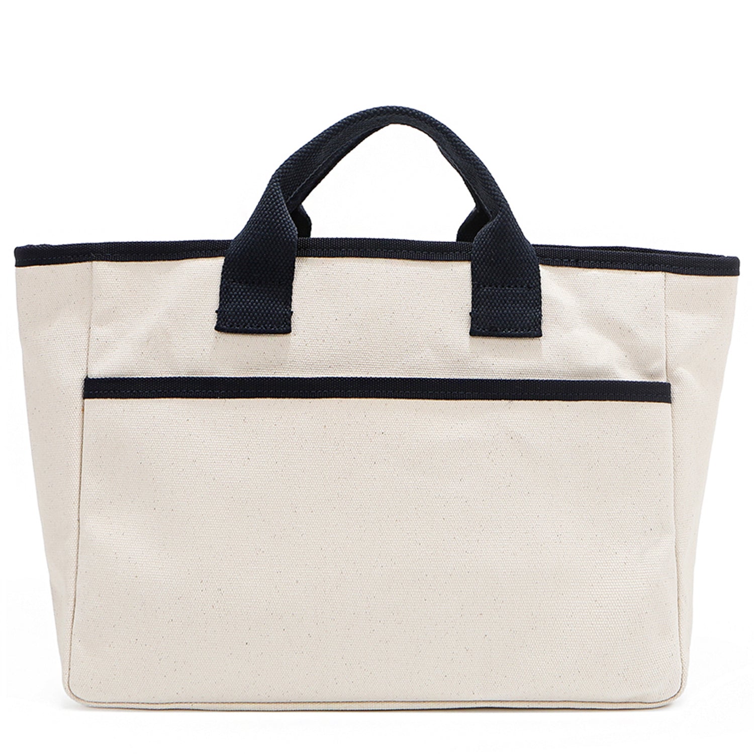 Back angle of the Emery handbag by Nodu Nadu in classic canvas-beige with navy blue trim. Made of polyester with dual top handles and a convenient black slip pocket to keep most-used items like your phone, keys, and planner close at hand. Dual top handles with a 3" drop allow you to carry this handbag by the top handles. 