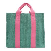 Back of the Nodu Nadu Sawyer Bag in Green. Light green canvas accented with baby pink straps for a pop of trendy color and femininity. Rectangular silhouette provides a sense of classic timelessness so you can dress up or dress down this everyday style. 