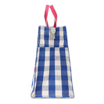 Rectangular and spacious side silhouette of the Nodu Nadu Blair Bag in Blue. Blue and white gingham print paired with hot pink dual straps. Side view shows the deep open slip pockets that you can store most-used items like your phone, keys, and makeup, close at hand! D-ring on the side for optional shoulder strap attachment.