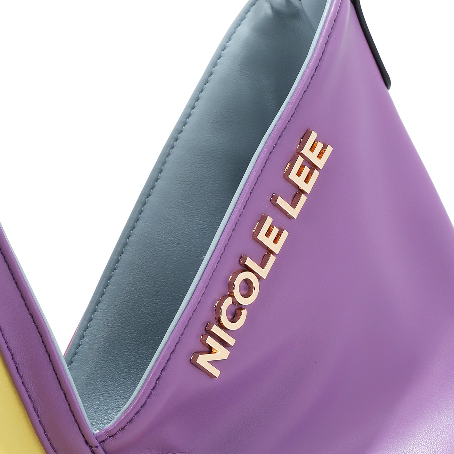 CLOSER VIEW TO OUR NICOLE LEE LOGO HARDWARE LETTERING 