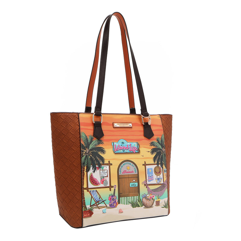 Our Nicole Lee Sun and Sand Tote bag with a colorful design of a beach scene and palm trees set on a white background.