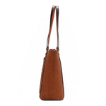 Our Nicole Lee Sun and Sand Tote bag in Brown handbag with woven pattern set on a white background