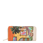 Our Sun and Sand wallet with tropical design set on a white background