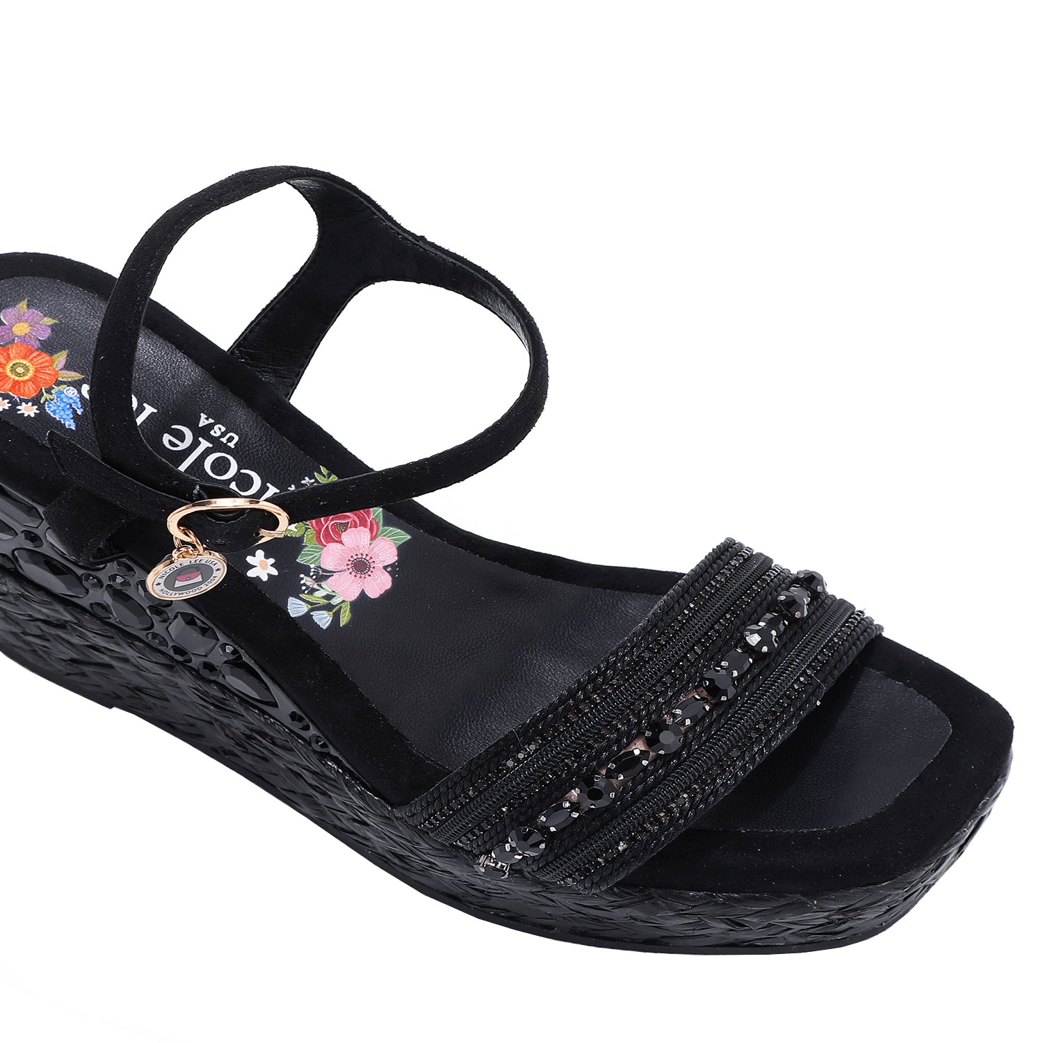 Kali Espadrille Wedge sandal in black.  Fitted with 1 adjustable buckle. .The insole is gold with the Nicole Lee logo. Top strap is embellished with rhinestones.