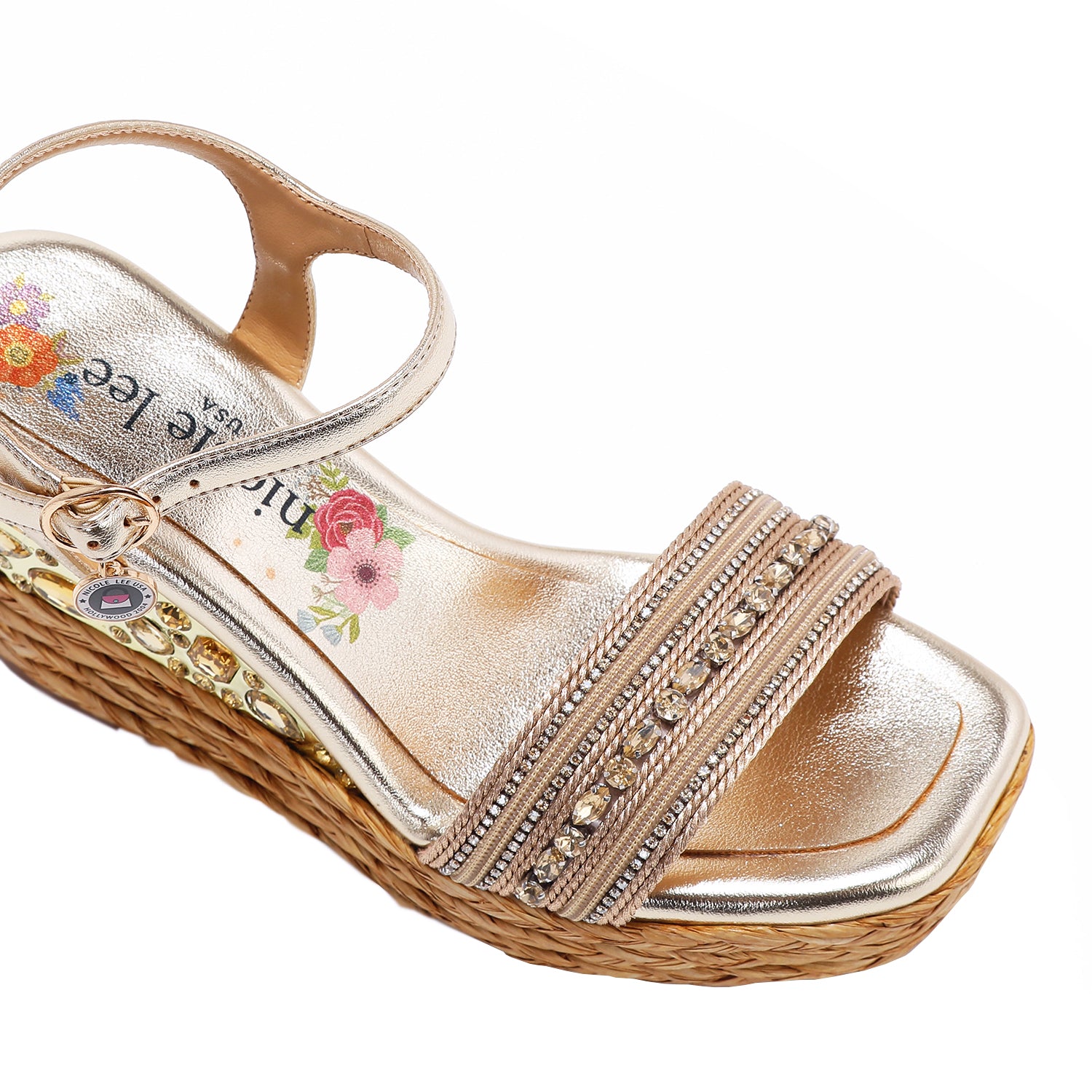 Kali Espadrille Wedge sandal in gold.  Fitted with 1 adjustable buckle. .The insole is gold with the Nicole Lee logo. Top strap is embellished with rhinestones.