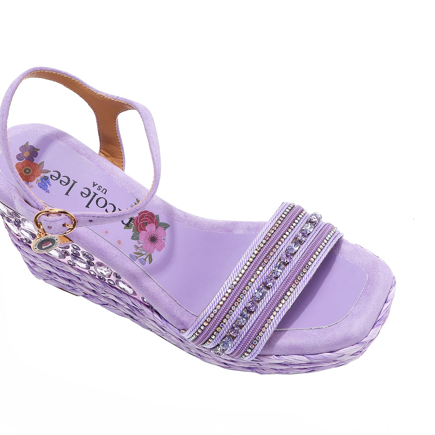 Kali Espadrille Wedge sandal in purple.  Fitted with 1 adjustable buckle. .The insole is purple with the Nicole Lee logo. Top strap is embellished with rhinestones.