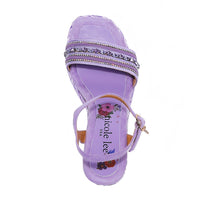 Kali Espadrille Wedge sandal in purple.  Fitted with 1 adjustable buckle. .The insole is purple with the Nicole Lee logo. The edge is velvet