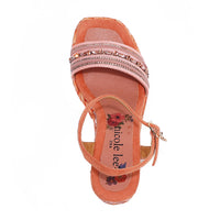 Kali Espadrille Wedge sandal in pink.  Fitted with 1 adjustable buckle. .The insole is pink with the Nicole Lee logo. The edge is velvet.