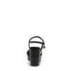 The platform  wedge is adorned with black rhinestones and  braid detailing.