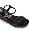 Kali Espadrille Wedge sandal in black.  Fitted with 1 adjustable buckle. .The insole is gold with the Nicole Lee logo. Top strap is embellished with rhinestones.