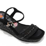 Kali Espadrille Wedge sandal in black.  Fitted with 1 adjustable buckle. .The insole is gold with the Nicole Lee logo. Top strap is embellished with rhinestones.