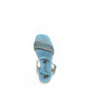 Kali Espadrille Wedge sandal in blue.  Fitted with 1 adjustable buckle. .The insole is purple with the Nicole Lee logo. The edge is velvet.