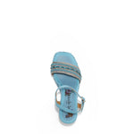 Kali Espadrille Wedge sandal in blue.  Fitted with 1 adjustable buckle. .The insole is purple with the Nicole Lee logo. The edge is velvet.