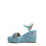 Kali Espadrille Wedge sandal in Purple.  Fitted with 1 adjustable buckle. The buckle has a small Nicole Lee Charm.The wedge is adorned with rhinestones and  braid detailing.