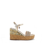 Kali Espadrille Wedge sandal in gold.  Fitted with 1 adjustable buckle. The buckle has a small Nicole Lee Charm.The wedge is adorned with rhinestones and  braid detailing.