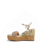 Kali Espadrille Wedge sandal.  Fitted with 1 adjustable buckle. The buckle has a small Nicole Lee Charm. The wedge is adorned with rhinestones and  braid detailing.