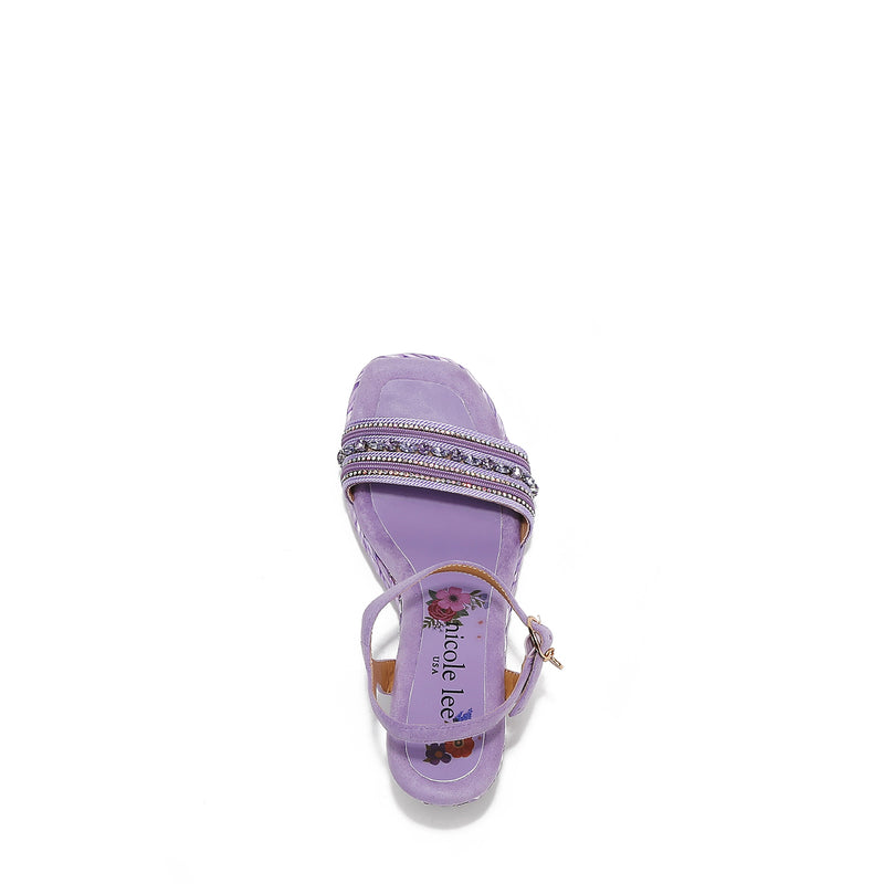 Kali Espadrille Wedge sandal in purple.  Fitted with 1 adjustable buckle. .The insole is purple with the Nicole Lee logo. The edge is velvet