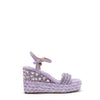 Kali Espadrille Wedge sandal in Purple.  Fitted with 1 adjustable buckle. The buckle has a small Nicole Lee Charm.The wedge is adorned with rhinestones and  braid detailing.