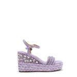 Kali Espadrille Wedge sandal in Purple.  Fitted with 1 adjustable buckle. The buckle has a small Nicole Lee Charm.The wedge is adorned with rhinestones and  braid detailing.