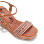 Kali Espadrille Wedge sandal in pink.  Fitted with 1 adjustable buckle. .The insole is pink with the Nicole Lee logo. Top strap is embellished with rhinestones.