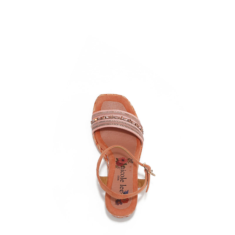 Kali Espadrille Wedge sandal in pink.  Fitted with 1 adjustable buckle. .The insole is purple with the Nicole Lee logo. The edge is velvet.