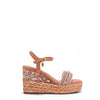 Kali Espadrille Wedge sandal in pink.  Fitted with 1 adjustable buckle. The buckle has a small Nicole Lee Charm.The wedge is adorned with rhinestones and  braid detailing.