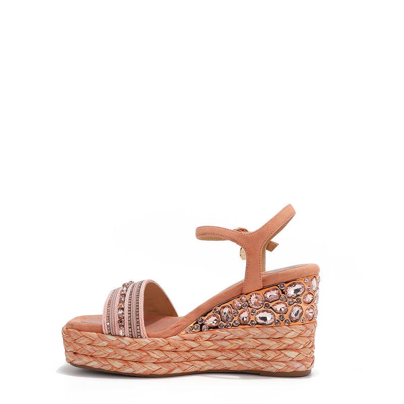 Kali Espadrille Wedge sandal in pink.  Fitted with 1 adjustable buckle. The buckle has a small Nicole Lee Charm.The wedge is adorned with rhinestones and  braid detailing.